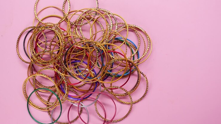 Colorful Bangles Rotating on a Pink Background