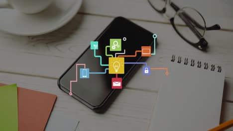 animación de una red de iconos a través de un teléfono inteligente en el escritorio