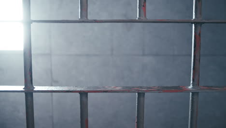 medium shot of a prisoner pacing in his cell