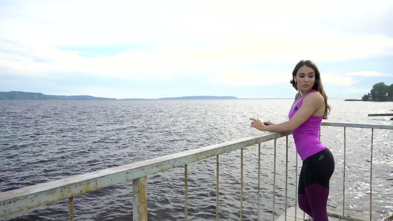 Woman enjoying the view of a river