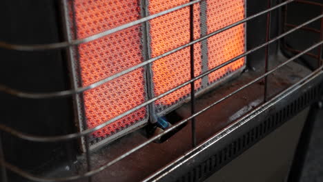 Ceramic-butane-gas-heater-glowing-close-up