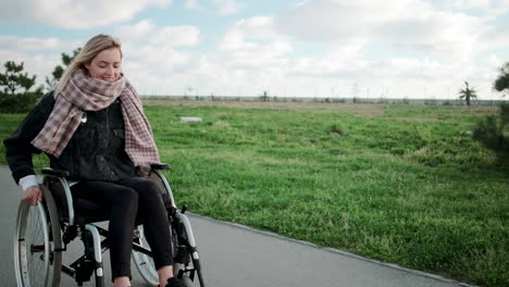 woman in wheelchair outdoors