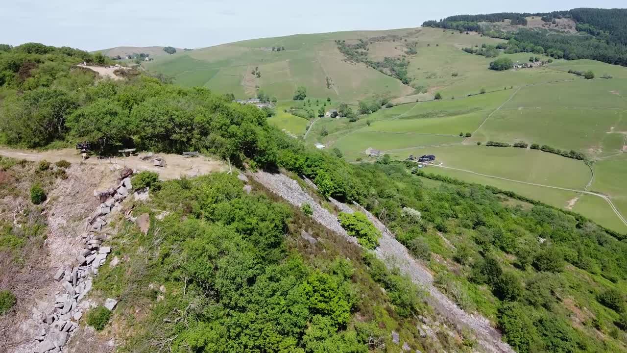 Revealing aerial drone clip of the countryside in Tegg's Nose country park near Macclesfield, United Kingdom
