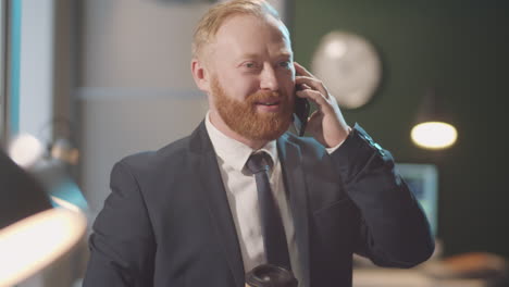 businessman on phone call in office