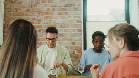 friends enjoying dinner together