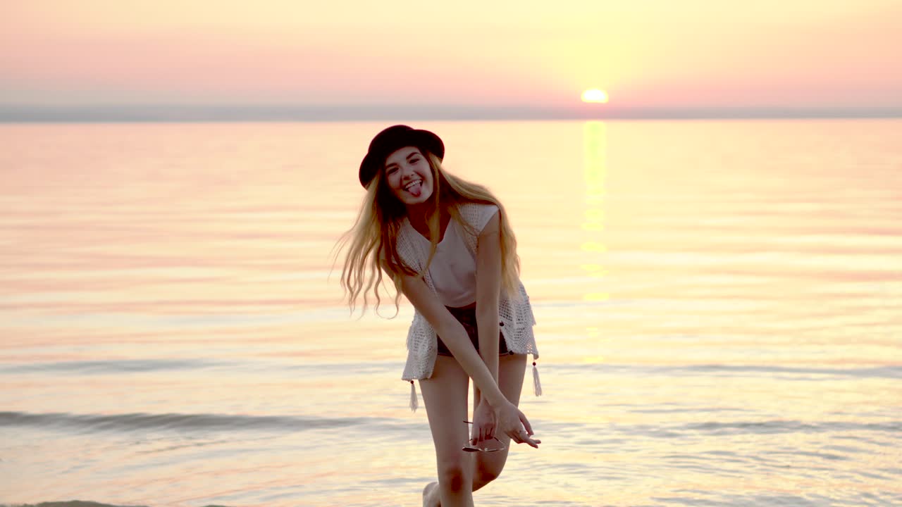 Happy Woman at Sunset Beach