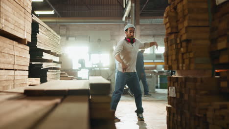 man working in a woodworking factory