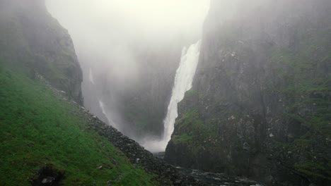 Misty-View-Though-Ravine-Of-Falling-Voringsfossen-Waterfall