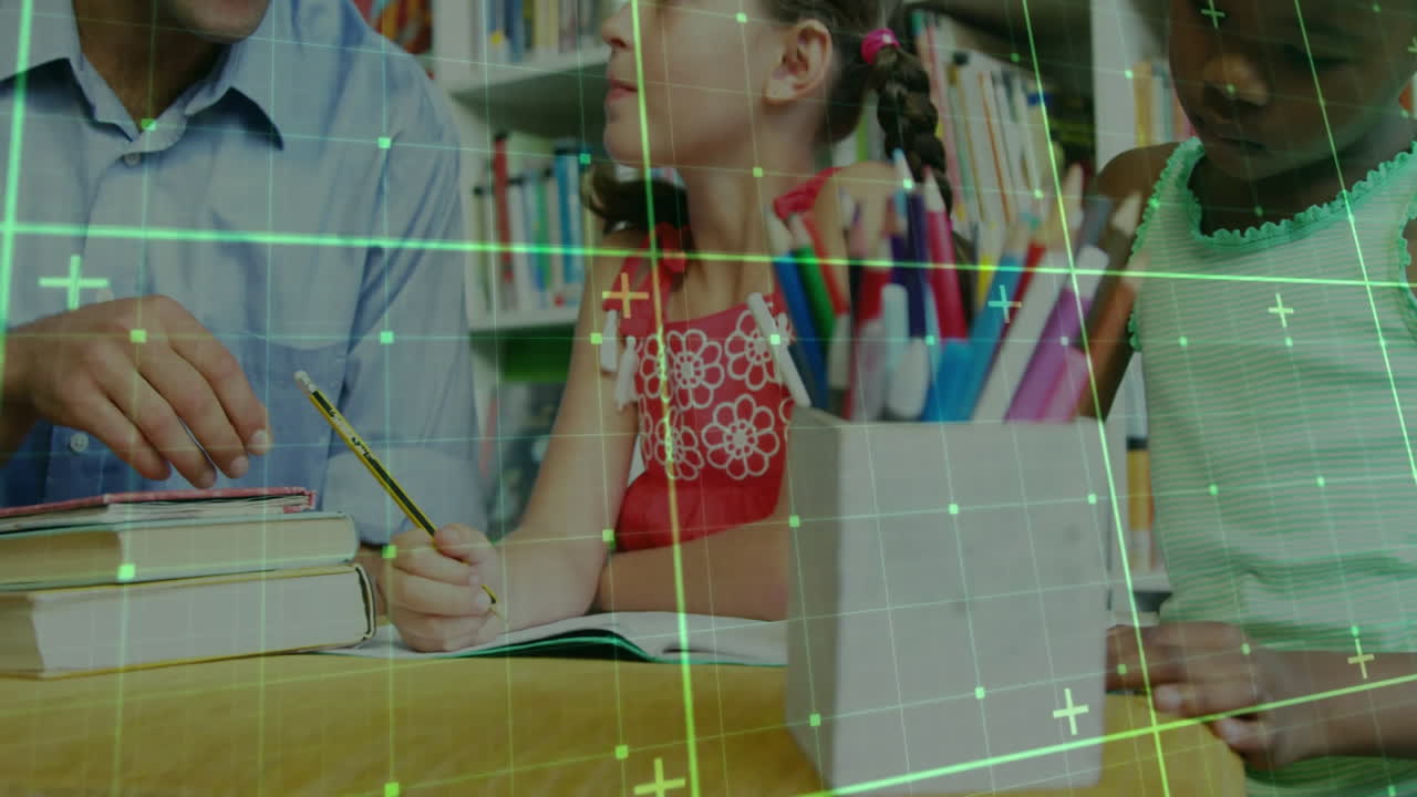 Teacher guiding two students with pencils at wooden table in education, overlaying green grid