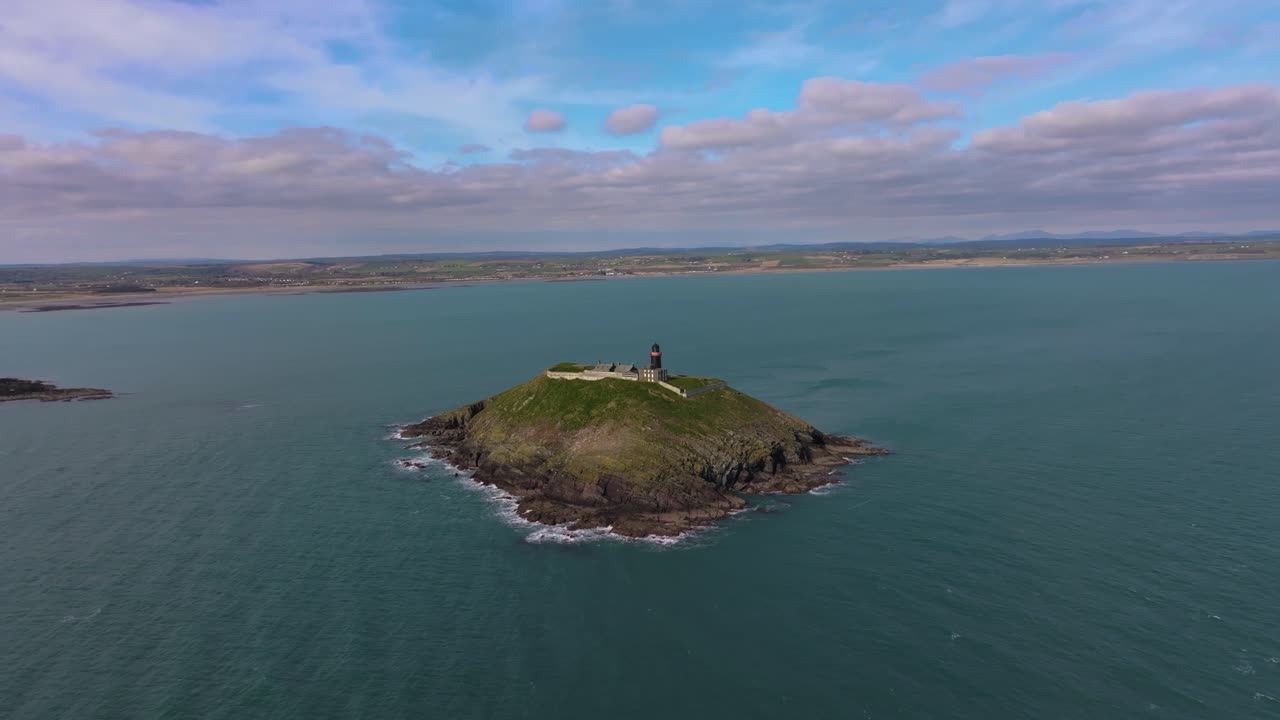 4K Cinematic Drone shot of the black Ballycotton Lighthouse overlooking the Atlantic Ocean, a symbol of Ireland’s maritime heritage Co.Cork - Ireland_11