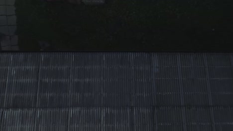 aerial top rising over rural building courtyard
