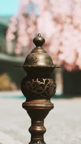 traditional japanese incense burner in a serene garden