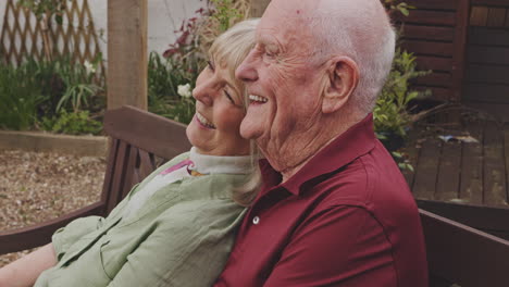an elderly couple enjoying each other's company outdoors