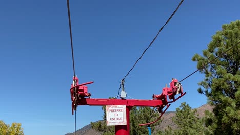 cables on rollers of supporting pole, aerial chairlift cableway mechanism