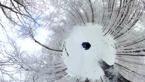 man walking through beautiful winter forest, 360 degree, vr, little planet effect