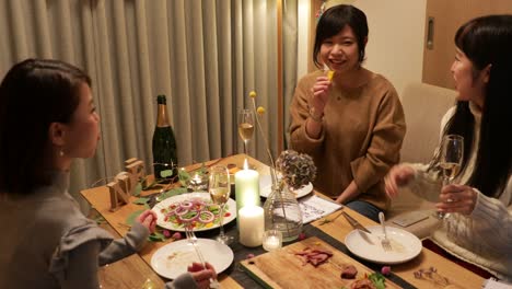 japanese girls enjoying christmas dishes