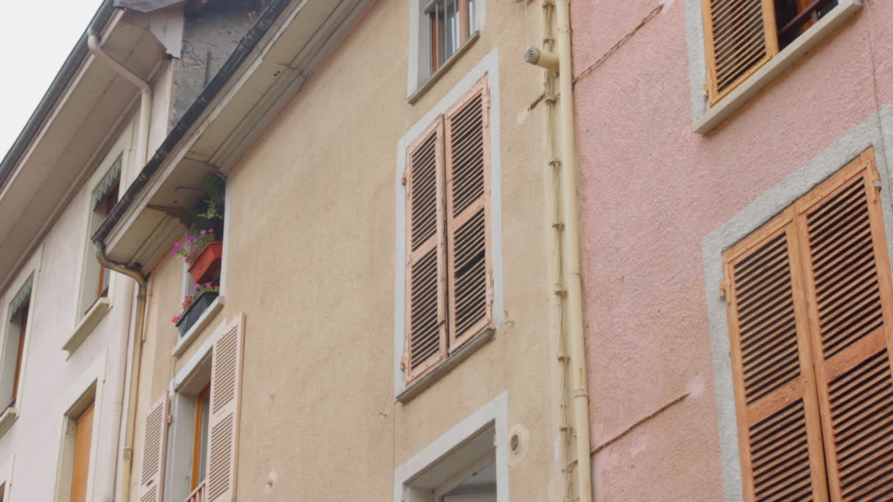 Old Houses with Wooden Shutters in a European City