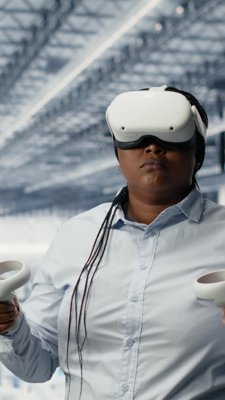 Vertical video Using VR headset gear, microchip and woman reviewing factory equipment