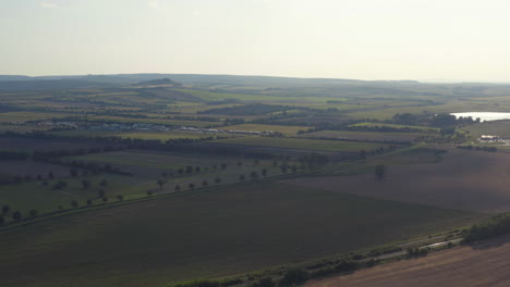 Vast-fields-and-meadows-in-moravian-countryside-in-Czechia,-drone-shot