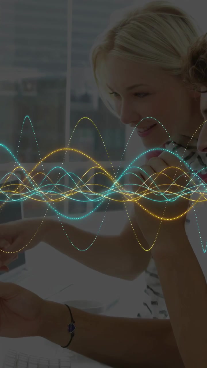 Vertical video: Mouse clicking, woman guiding peer, pointing, typing waveform crossing for business
