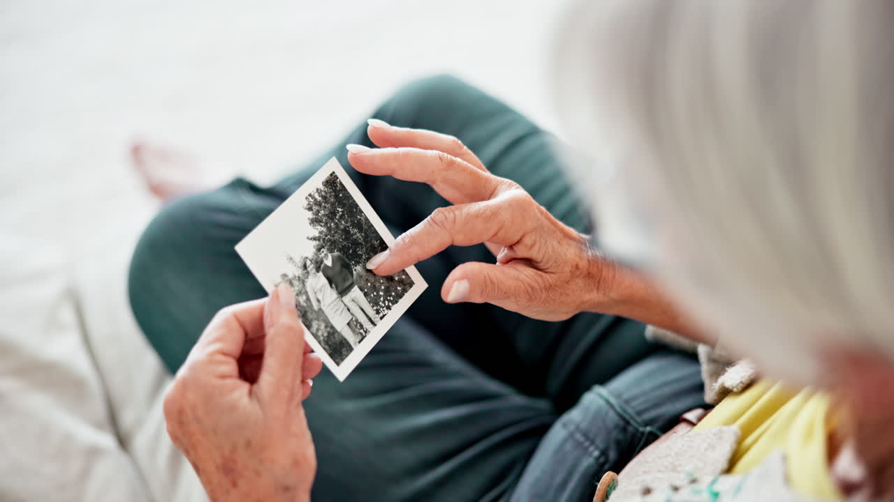 Closeup, home and old woman with a picture
