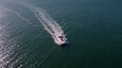 aerial view of friends sailing on yacht deck