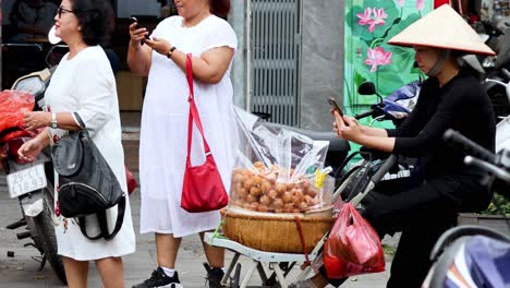 vendor selling food on hanoi street