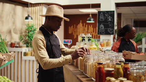 african american seller preparing local farmers market products