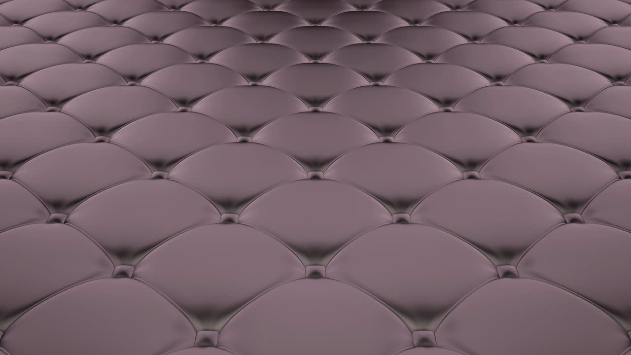 3D animation of the flight over a gray metal quilted surface. Looped video.