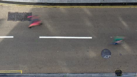 birds eye view time lapse of colorful marathon runners on road