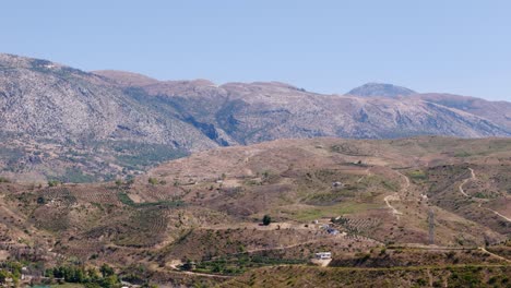 aerial view flying across the turkish taurus mountain range and scenic rural valley terrain