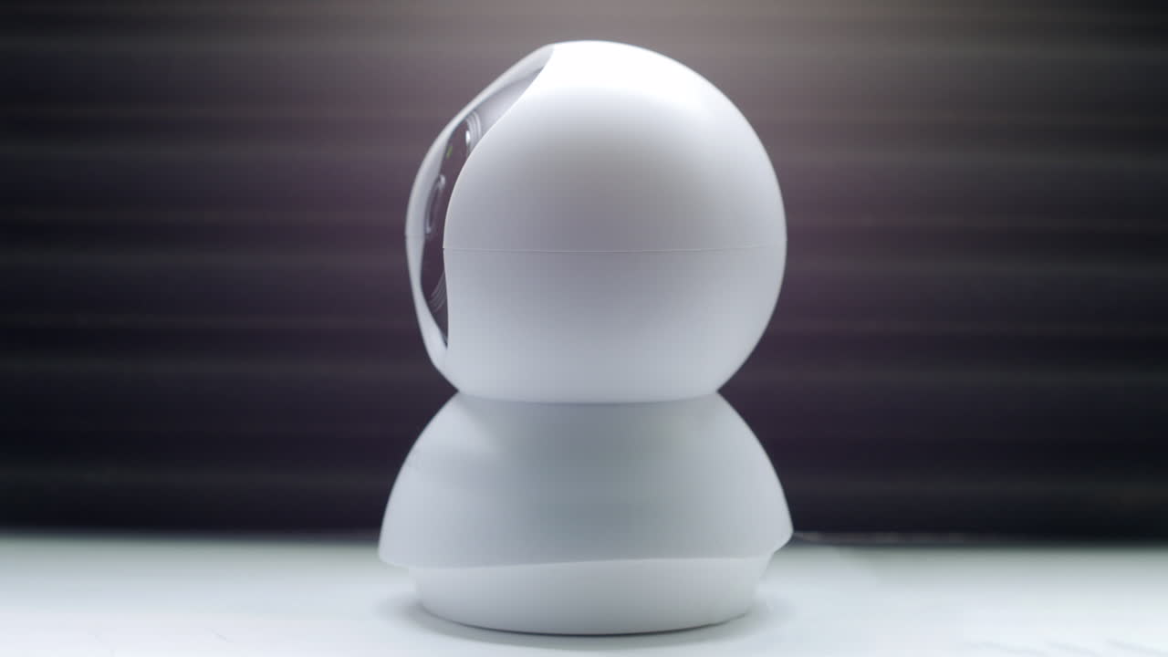 A Moving Remote IP CCTV Surveillance Camera Dome Rotating Around Left ...
