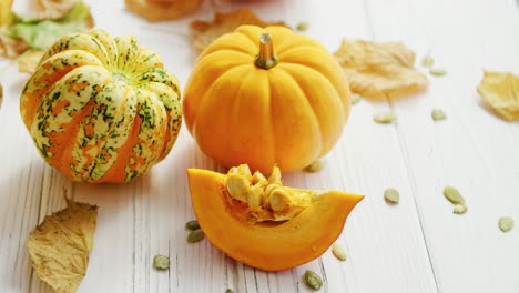 Yellow-pumpkins-and-dried-leaves