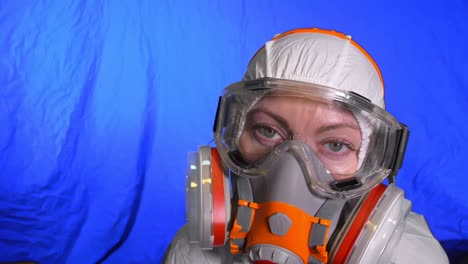 scientist virologist in respirator. woman close up look, wearing protective medical mask. concept health safety n1h1 coronavirus epidemic 2019 ncov.