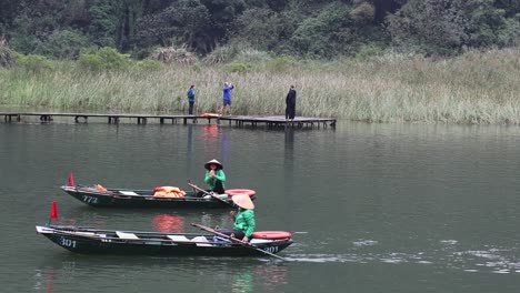 individual rowing smoothly across a tranquil lake