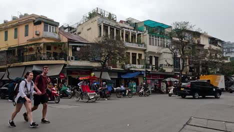 vehicles and pedestrians in a dynamic urban setting