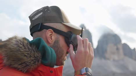 drone pilot adjusts his fpv glasses in preparation for an immersive flight experience