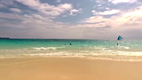 typical morning at boracay beach, a popular tourist destination in the philippines known for its lovely weather and long stretches of white sand.