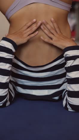 woman practicing yoga backbend