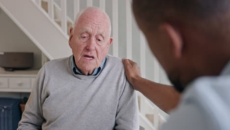 elderly man receiving support from caregiver