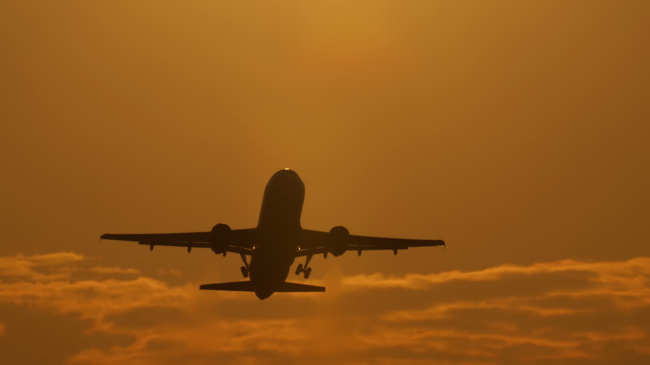 Airplane Silhouette at Sunset