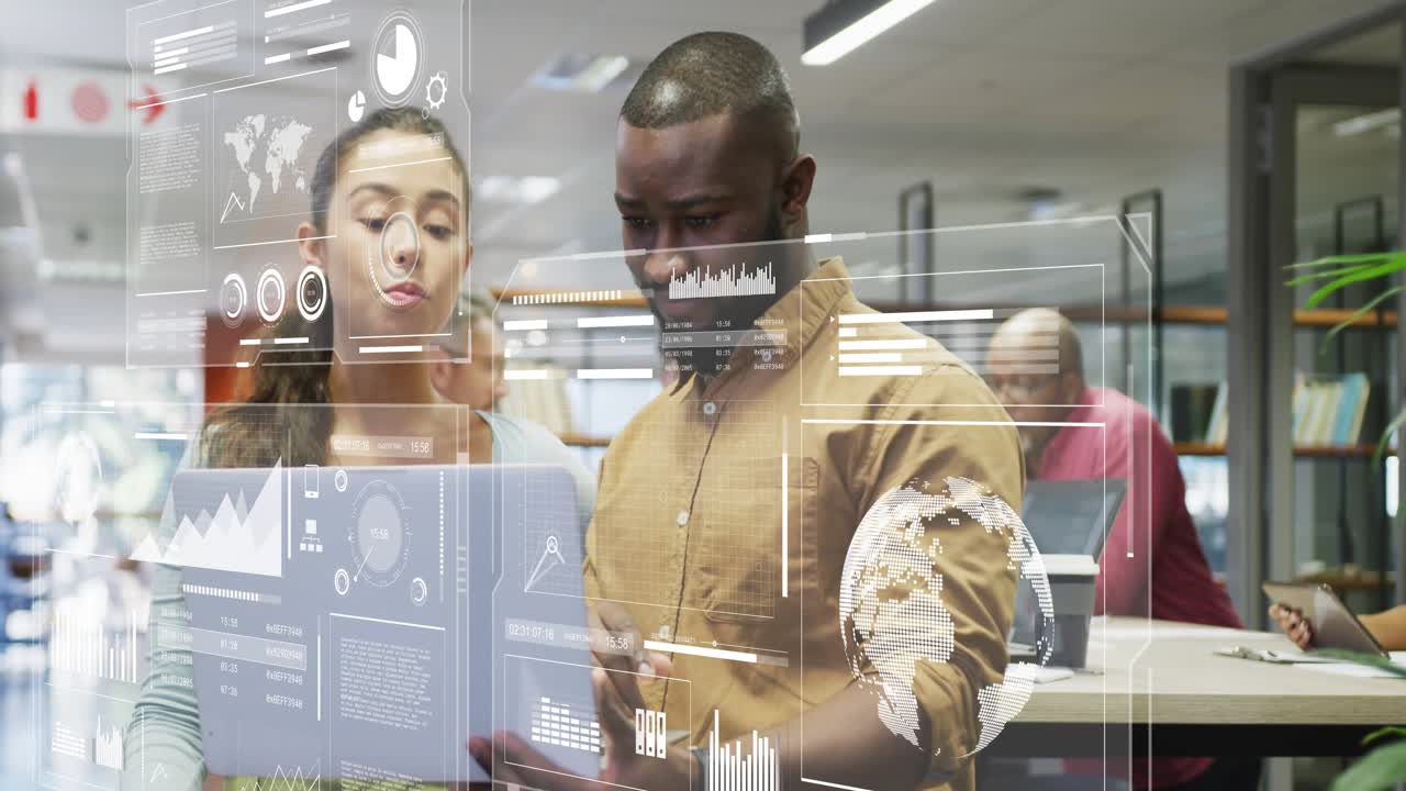 Man holding laptop and woman pointing at screen, reviewing business data with HUD overlaying laptop