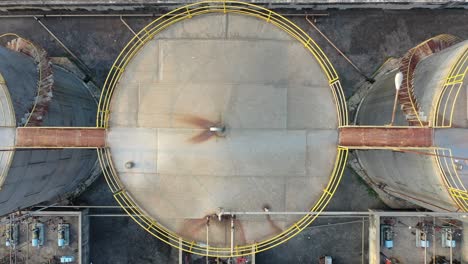 aerial view of industrial plant with storage tanks