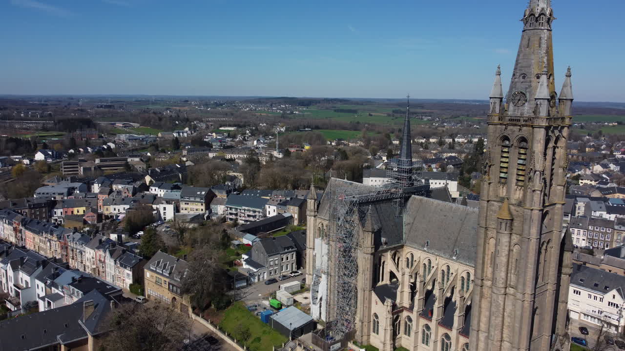 Aerial View of a Cathedral Under Construction in a European Town