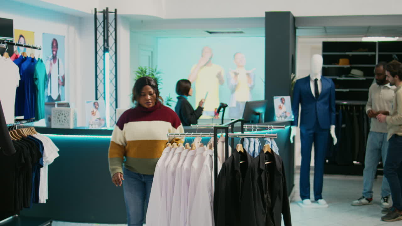 People shopping for clothes in a store