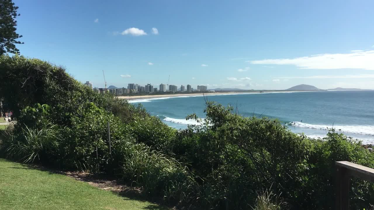 Sweeping view of a surfing beach in Australia