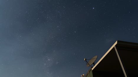 starry sky, milky way galaxy time-lapse at night, clear sky full of stars, antenna in the foreground