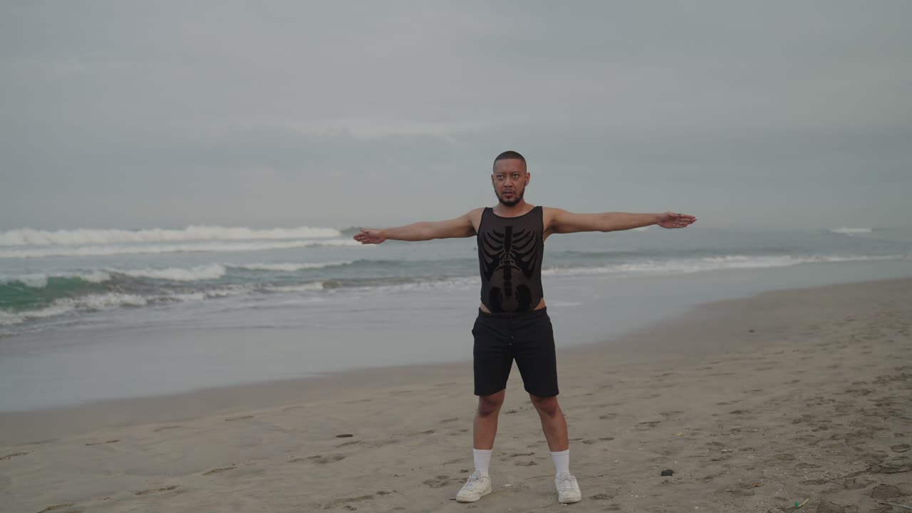 Man exercising on the beach
