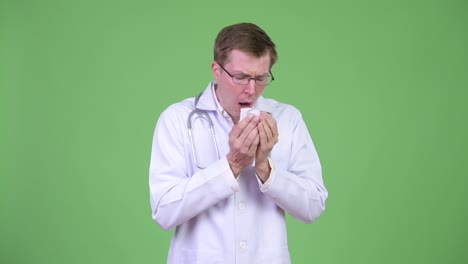Man Doctor Having Flu While Sneezing And Coughing