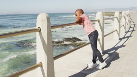 video of african american boy looking at sea